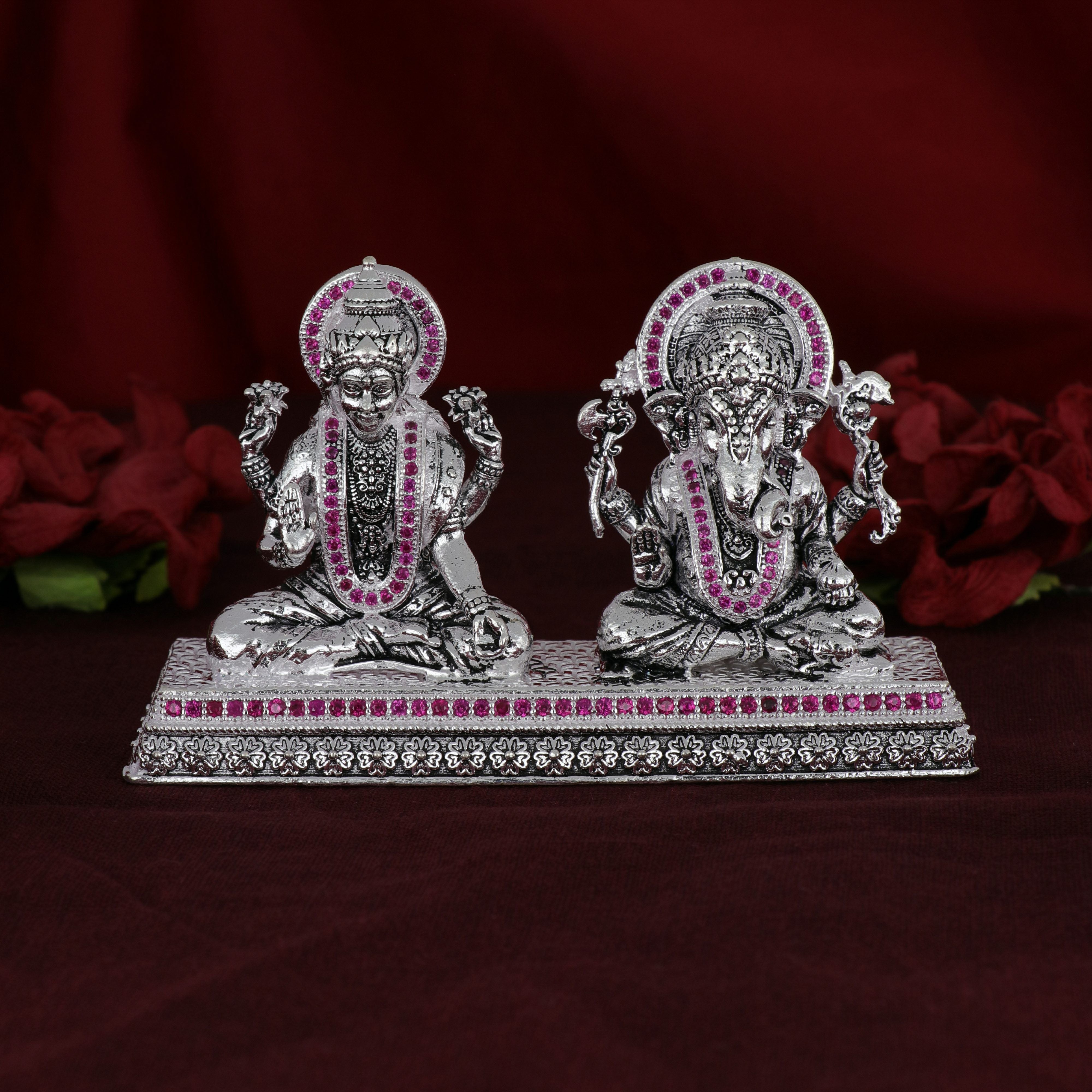 Shri Ganesh Laxmiji Silver Murti Collection adorned with Pink Stones