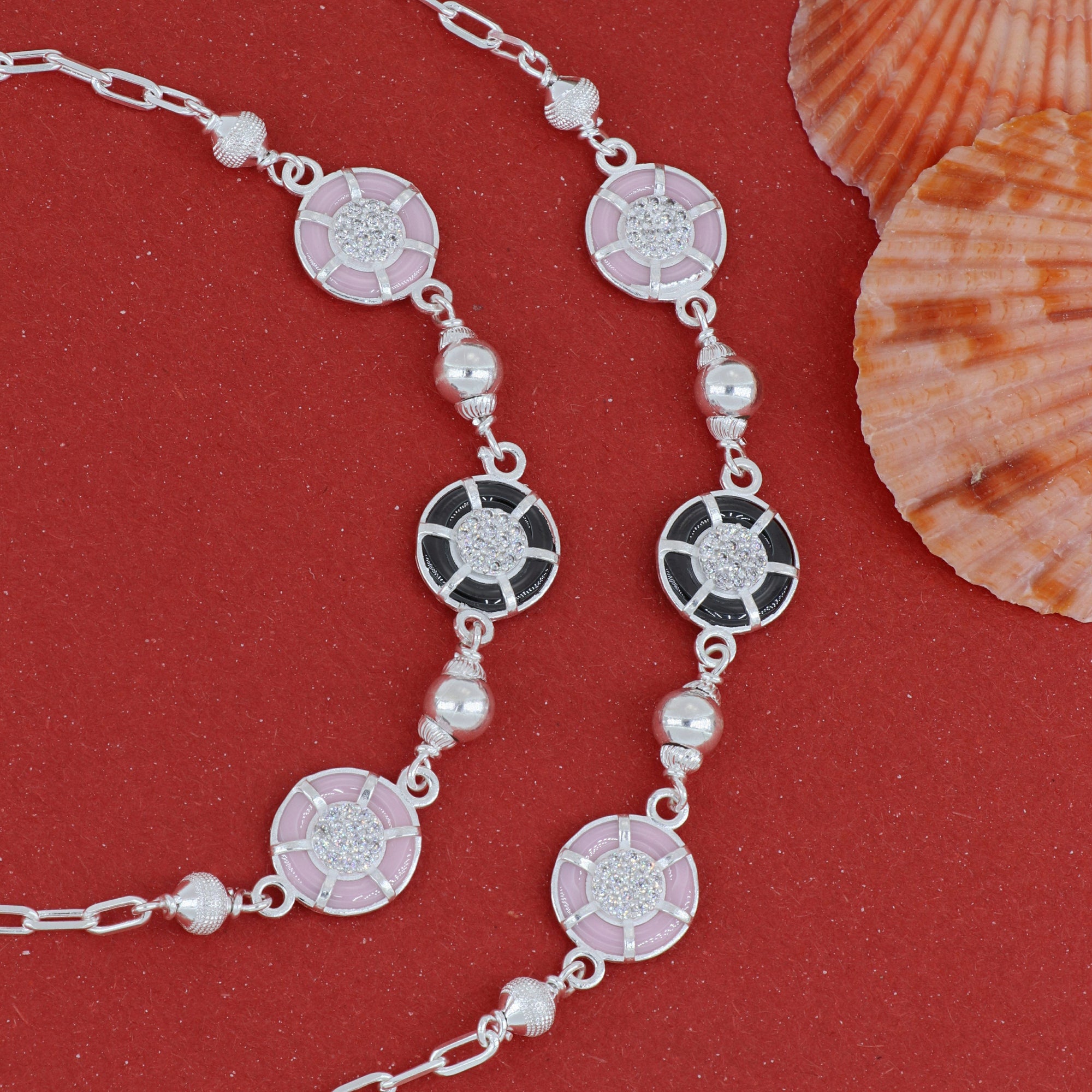925 sterling silver station chain necklace with pink and black enamel floral charms