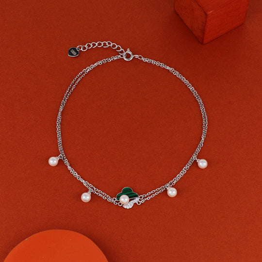 Silver charm anklet suited to meaningful gifting