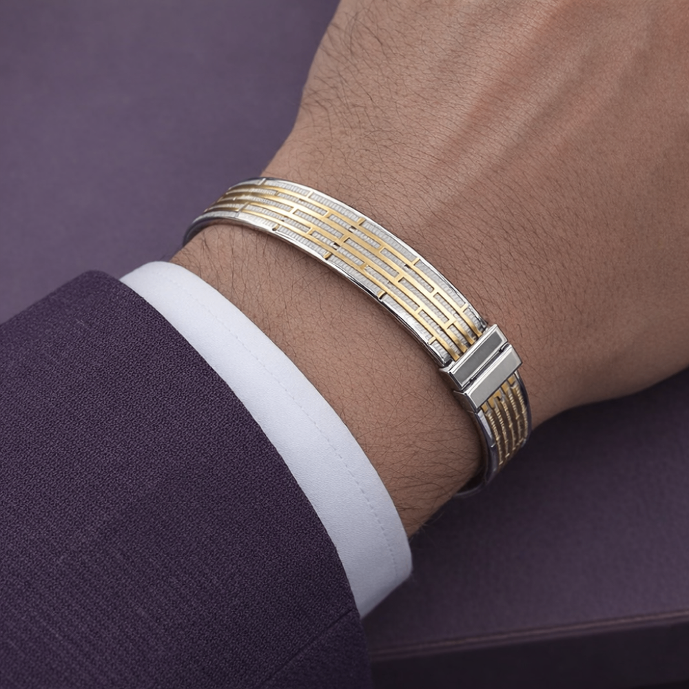 Man wearing a two-tone 925 sterling silver bracelet with a contemporary design
